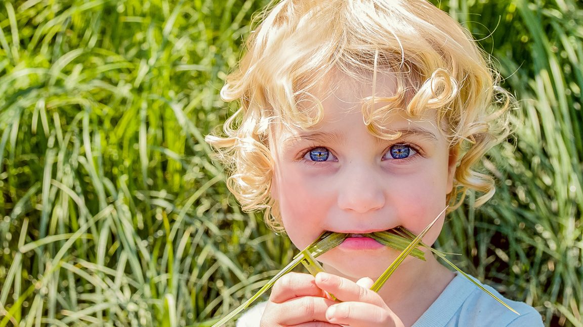 girl-eating-grass